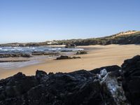 Portugal's Coastal Landscape: Sunlight and Azure Water