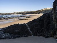 Portugal's Coastal Landscape: Sunlight and Azure Water