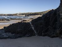 Portugal's Coastal Landscape: Sunlight and Azure Water