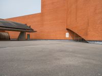 Portugal Concert Hall: Open Space under Cloudy Skies