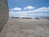 Portugal Day: Beach and Ocean with Clouds