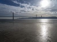 Portugal's Harbor: A View of the Bridge and Jetty Along the Coastline