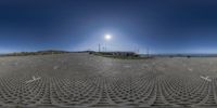 a large solar array that is in the middle of an open field with grass in it