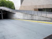 a street sign indicating the way of a parking lot with a fire hydrant at the end