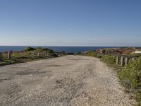 Straight Road with Armco Barrier and Clear Sky in Portugal