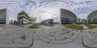 a large glass window looking at an image on the outside of it with buildings in the back