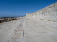 Portugal's Coastal Line Unveiled: The Concrete Wall