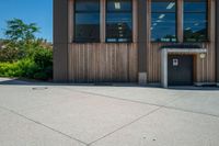 this is an image of a building with wood on the front and outside of it