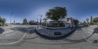 a 360 view photo shows an intersection with no one in sight at it, and no one out there