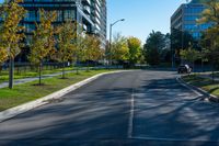 the empty street is quiet on a sunny day in autumn - like colors and shapes