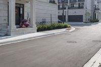 the street in a european city has been cleaned and empty of people or cars and it's very quiet