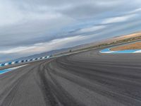 Race Track: Asphalt Curves on a Sunny Day