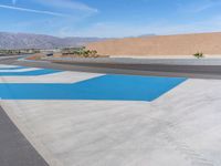 Race Track in the USA: Asphalt Road with Dramatic Clouds