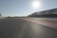 Race Track: Automobiles in Motion Blur