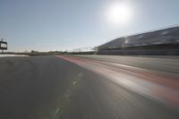 Race Track: Automobiles in Motion Blur