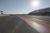 Race Track: Automobiles in Motion Blur