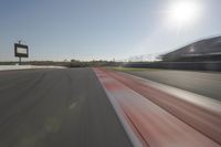 Race Track: Automobiles in Motion Blur