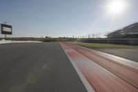 Race Track: Automobiles in Motion Blur