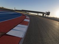 Race Track: A Car's POV Under Clear Skies