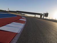 Race Track: A Car's POV Under Clear Skies