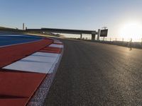 Race Track: A Car's POV Under Clear Skies