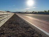 Race Track Curve: Asphalt with Sun Visible