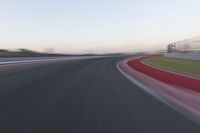 POV Racing: Motion Blur Straight Down the Road on a Race Track