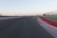 POV Racing: Motion Blur Straight Down the Road on a Race Track