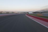 POV Racing: Motion Blur Straight Down the Road on a Race Track