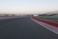 POV Racing: Motion Blur Straight Down the Road on a Race Track