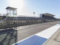 Race Track Road with Clear Sky and Sun
