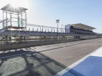 Race Track Road with Clear Sky and Sun