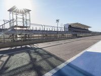 Race Track Road with Clear Sky and Sun