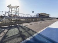 Race Track Road with Clear Sky and Sun