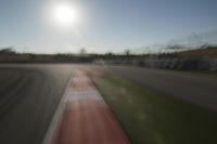 Race Track Days: Sun Visible against a Clear Sky