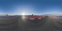 an image of a 360 view of race tracks, taken from the side of a moving car