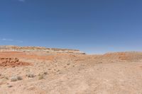 the desert is very sparse, with no people on it and no people walking around