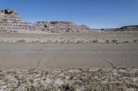 Red Rock Formation and Asphalt Road in Utah