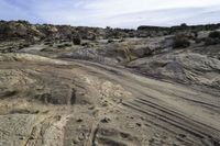 the road to the top of the rock formation is curved and winding up to the top of the hill