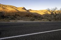 Red Rock Mountains: A Stunning View of Grass and Trees in Utah