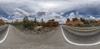 a highway with no traffic is shown in this 360 - zoom image of the desert