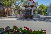 the flower shop is very neat and well maintained on the street corner, but is not far away from the house