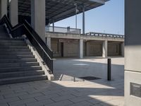 the empty parking lot is full of concrete pillars and balks, but only one person in it