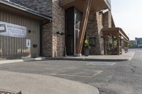 this is an image of the outside of a building with a sign saying good luck