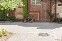 a building with a fire hydrant on the side and a sign in front of it