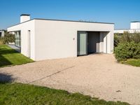 Residential Area in Europe: A House Surrounded by Gravel