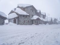 Residential Area with Snow-Covered House in the Alps