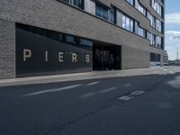 there is a sign on the building that says pier 8 on it's side