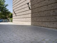 the wall of a building is made out of bricks, as if being inside a garage