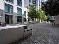 two courtyards, in the middle of the city are very neat, but have little trees and bushes